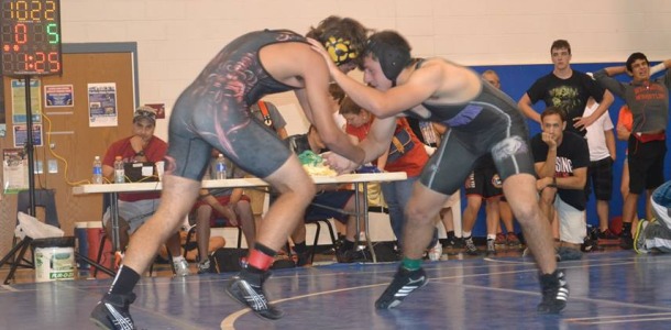 Wyatt Slavin taking on an opponent during a wrestling match