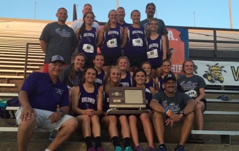 Girls track team with their 2014 4A State championship trophy.  