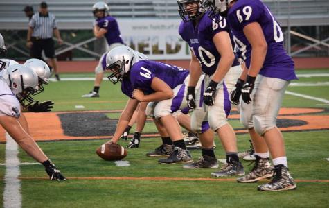 Purple Team lines up against White teams defense.