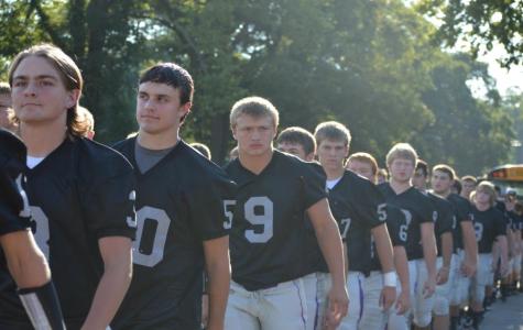 The football team unveiled their new black uniforms at the Back in Black Bash.