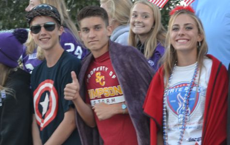 Seniors Austin Ward, Brendan Owings, and Madeline Nuefeld supporting the Football Team at KC Piper.