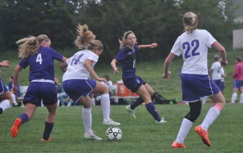 Sophomore Isabel Tiller in action in a soccer game.