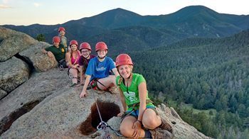Members of Venture Crew 2052 pausing for a break on their 150+ mile trek through Rocky Mountains.