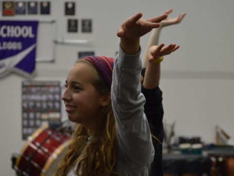 Sophomore Kayla Mountain rehearsing for Seussical