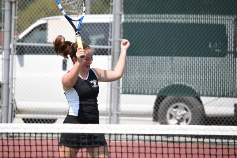 Sophomore Makena Martinez celebrating a point win at the at the Baldwin Invitational Tournament.