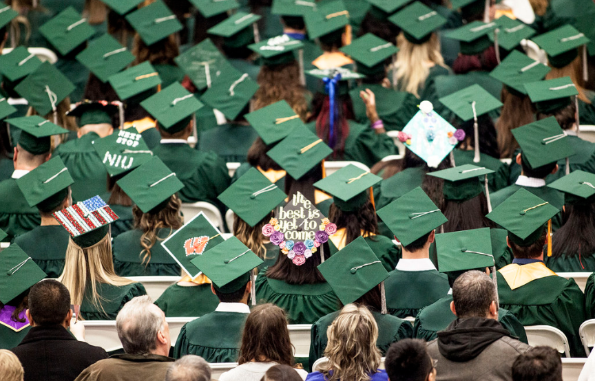 Students attending college graduation