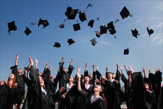 Students celebrating about getting through their journey of college.