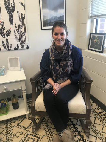 Novotney sitting in her office ready to listen to students.