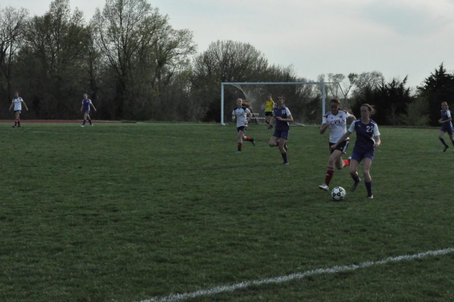 Riley Smith runs the ball up the field. They played Cair Paravel.