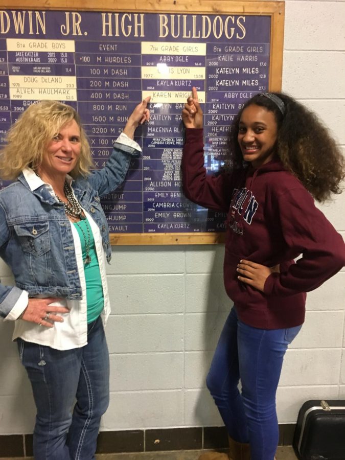 BJHS track sprinter Fisayo Afonja recently knocked off her teachers 42-year old record, social studies teacher Chris Kile (Lyon).