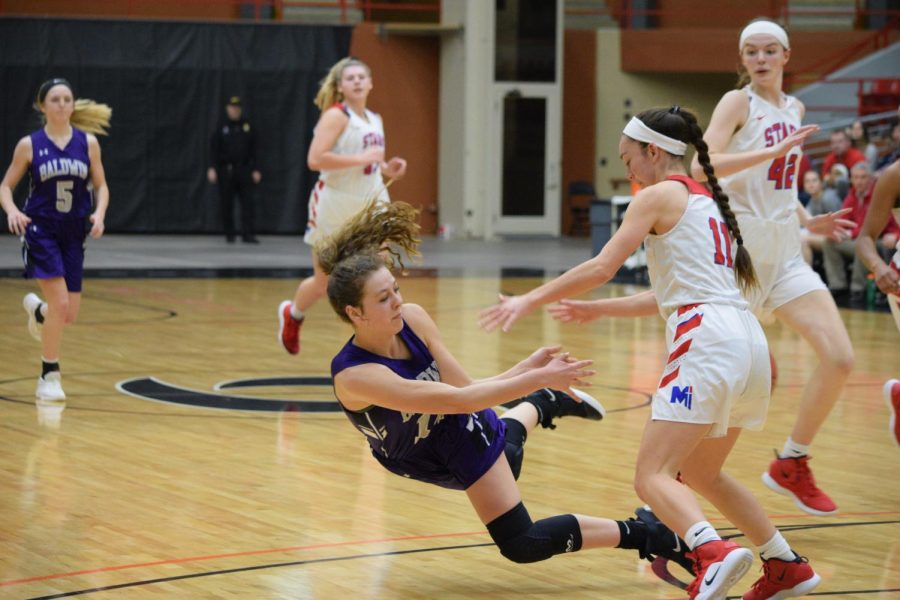 Baldwin Girls Basketball competing against Bishop Miege in the state tournament. Bishop Miege ended up winning the 4A state title.