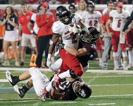 Photo by John Raoux/AP/Shutterstock (10034890n)
Morningside linebacker Jacob Katzer, bottom, and linebacker Joel Katzer (39) tackle Benedictine running back Marquis Stewart during the second half of the NAIA Championship college football game, in Daytona Beach, Fla
NAIA Championship Football, Daytona Beach, USA - 15 Dec 2018