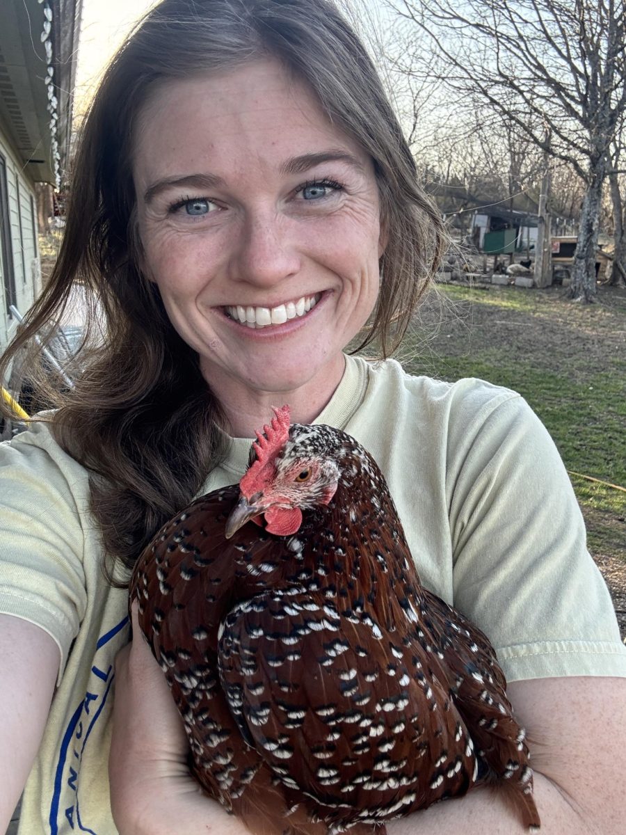 Renae Linke a BHS Biology teacher, with her chicken.